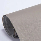 Four colour options of self-adhesive leather patches — black, grey, white, beige-white — on white background