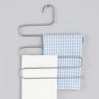 5-Layer Pants Hanger — Aluminium mounted in modern interior