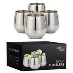 Outdoor patio stainless steel tumblers wooden table natural lighting garden
