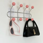 Wall Coat Rack with Ball Hooks styled with home decor