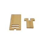 Bamboo phone stand on kitchen bench holding phone beside a coffee cup in a warm morning light setting