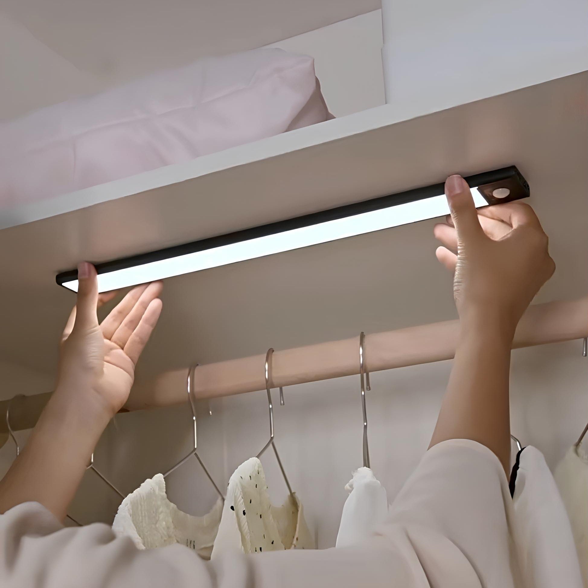Motion sensor LED light styled with modern home accessories minimalist composition