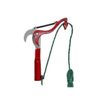 Flat-lay of rope branch pruner with gardening gloves and pruning off-cuts on stone garden surface